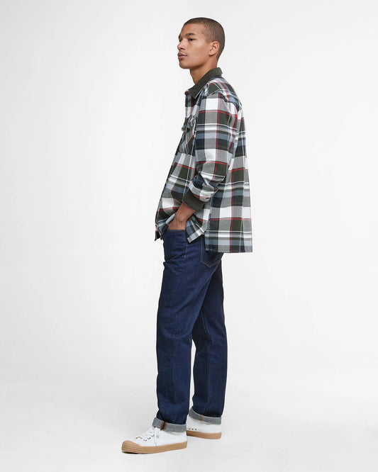 The Barbour Grasmoor Relaxed Long-Sleeved Shirt combines rugged charm with timeless elegance.