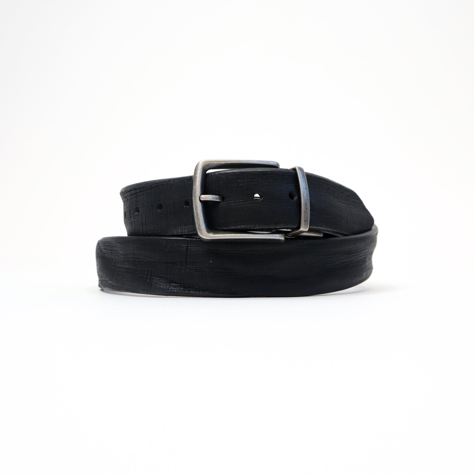 A sleek black Italian leather Magic Flex belt featuring a silver-tone stretchable buckle