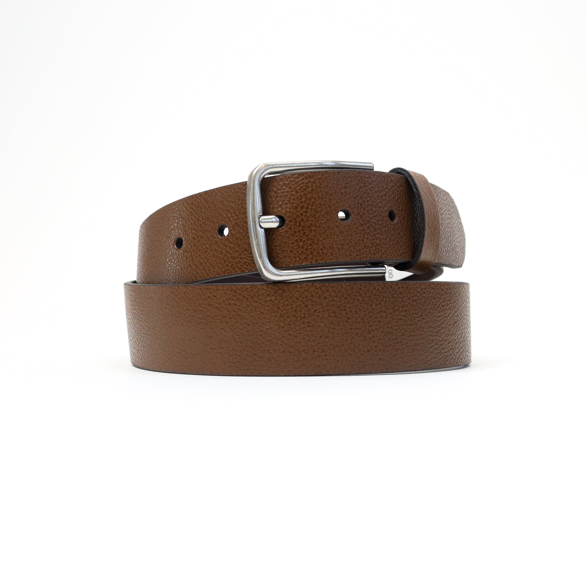 A handmade Italian tan leather belt featuring a silver-tone buckle, elegantly rolled for display.