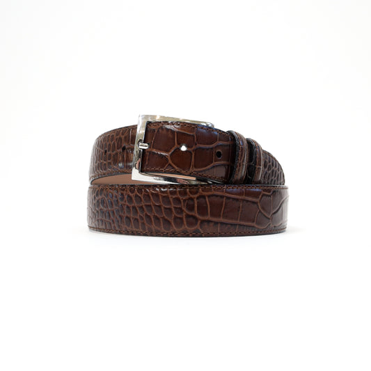 A handmade Italian brown croc-embossed leather belt with a silver-tone stretchable Magic Flex buckle