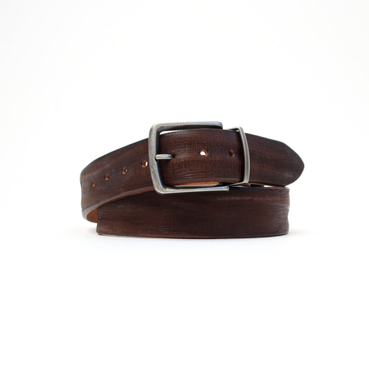 A rich dark brown Italian leather Magic Flex belt with a silver-tone stretchable buckle
