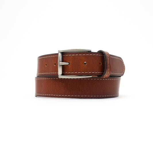 A handmade Italian brown leather belt featuring contrast stitching and a silver-tone buckle, elegantly coiled for a refined look.