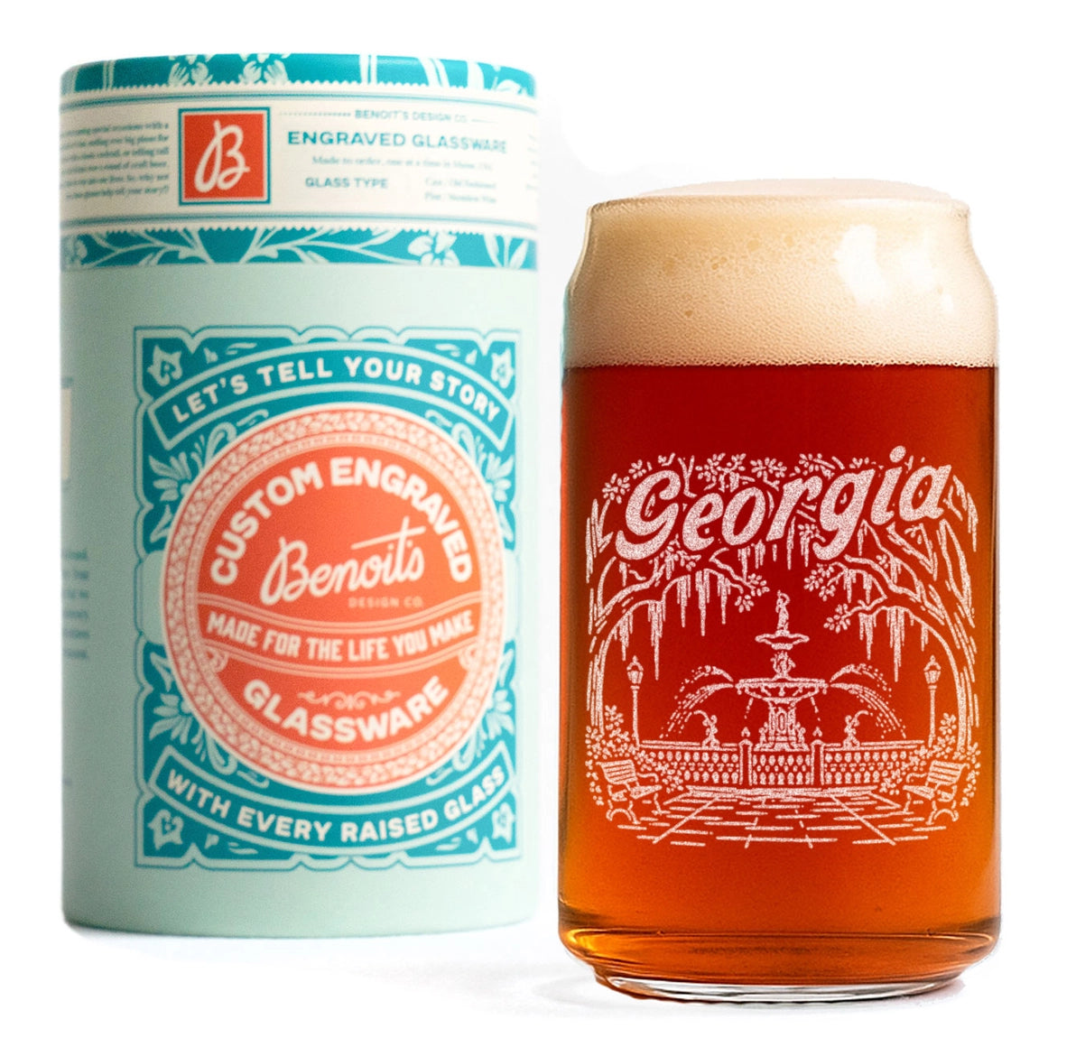 A custom engraved glassware set featuring a tall cylindrical pint glass filled with amber beer and foam, alongside its matching light blue and teal printed packaging canister. The glass is engraved with 'Georgia' and a fountain illustration, and the canister displays the brand 'Benito'.
