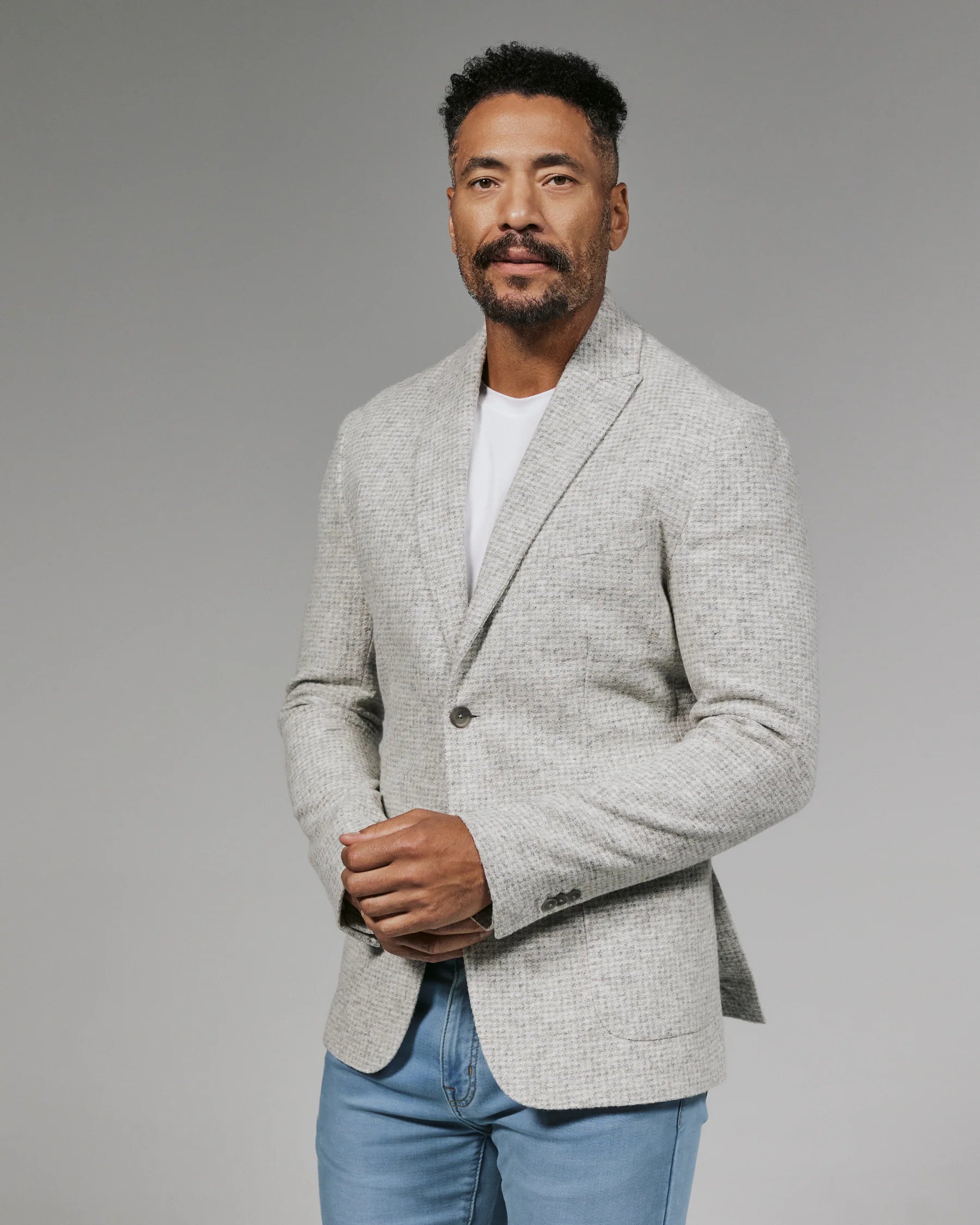 Ecru Knit blazer with brown buttons